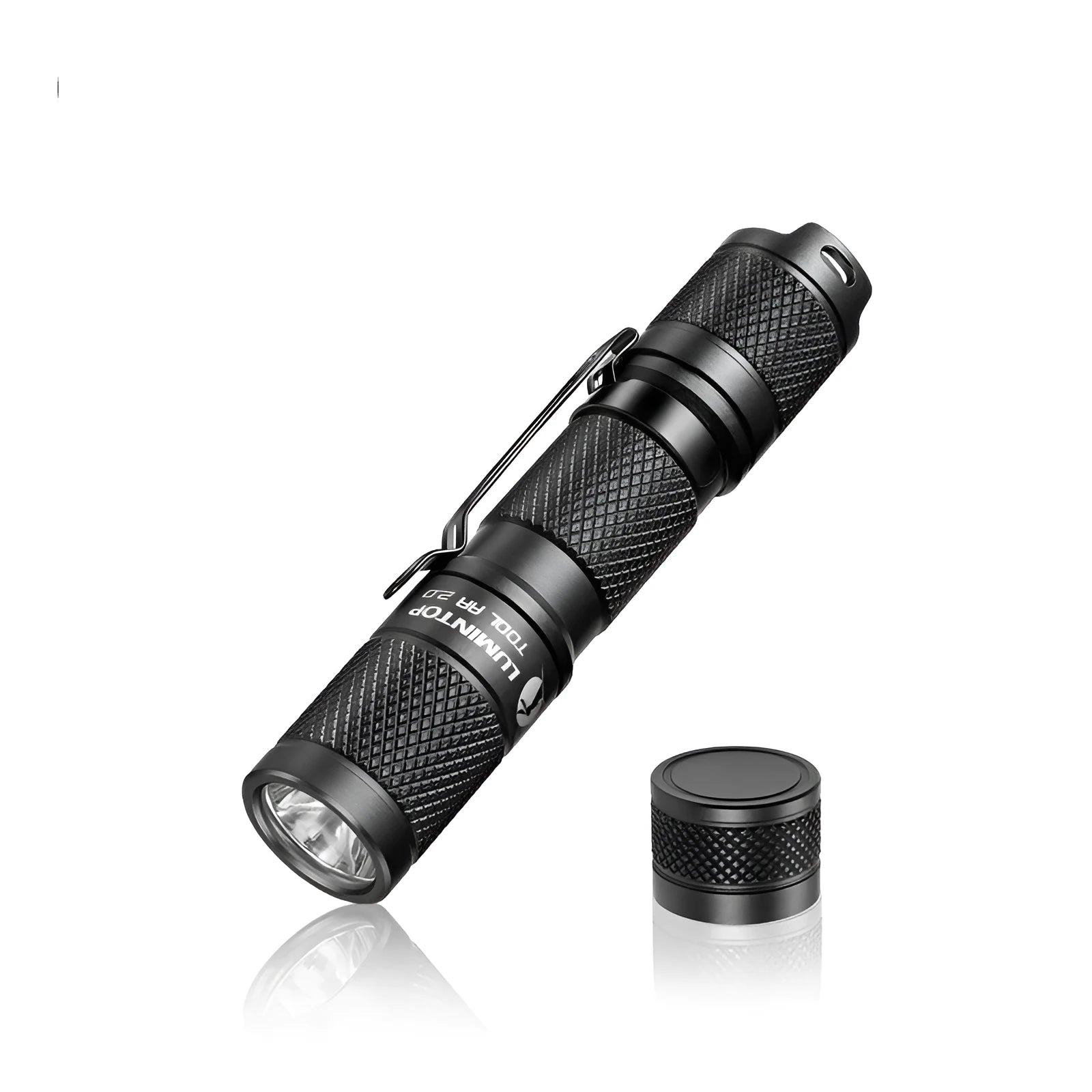 Black Lumintop Tool AA 2.0 aluminium keychain flashlight with magnetic tail cap and diffuser accessory.