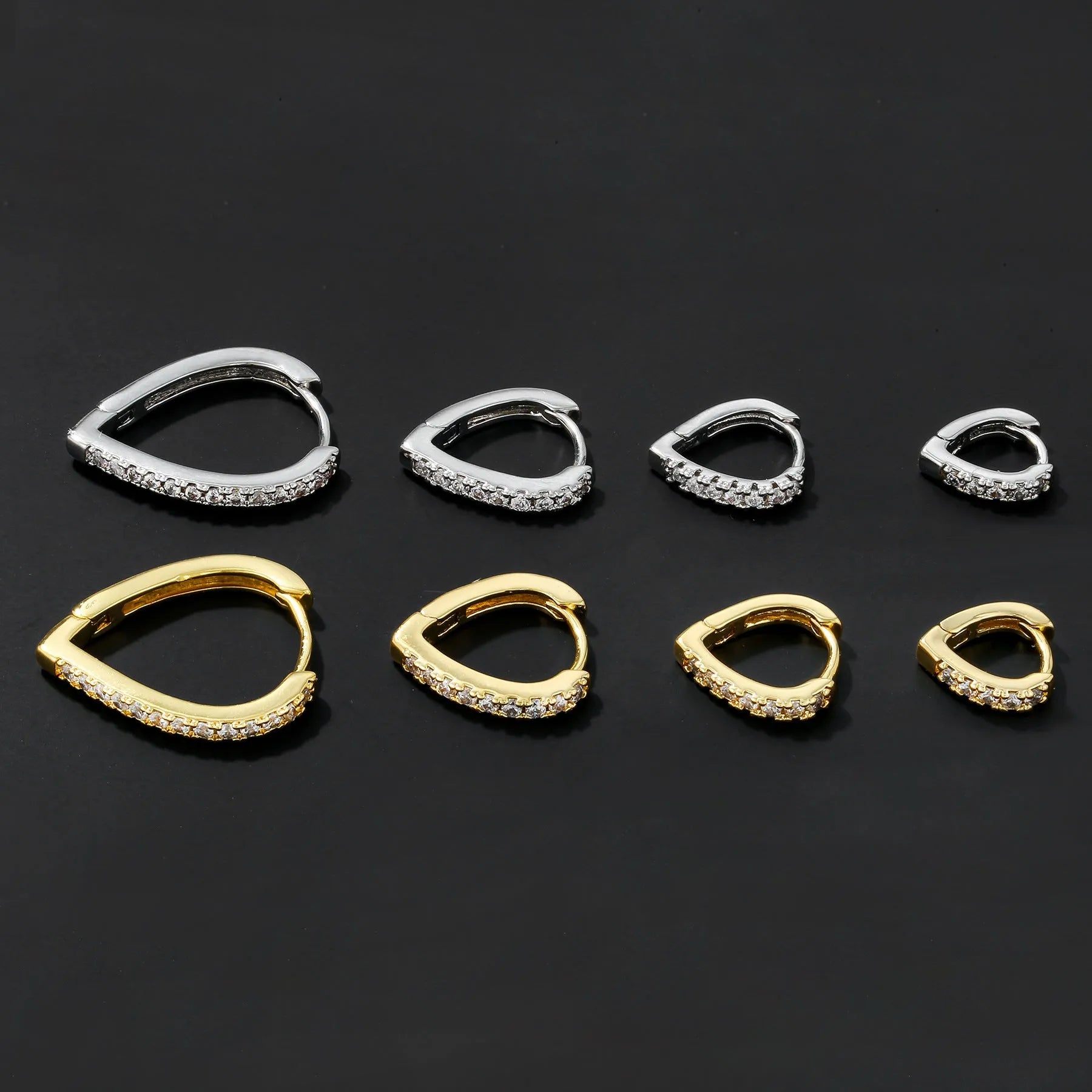 Electroplated copper ear clip with heart geometry design in gold and white gold colour options