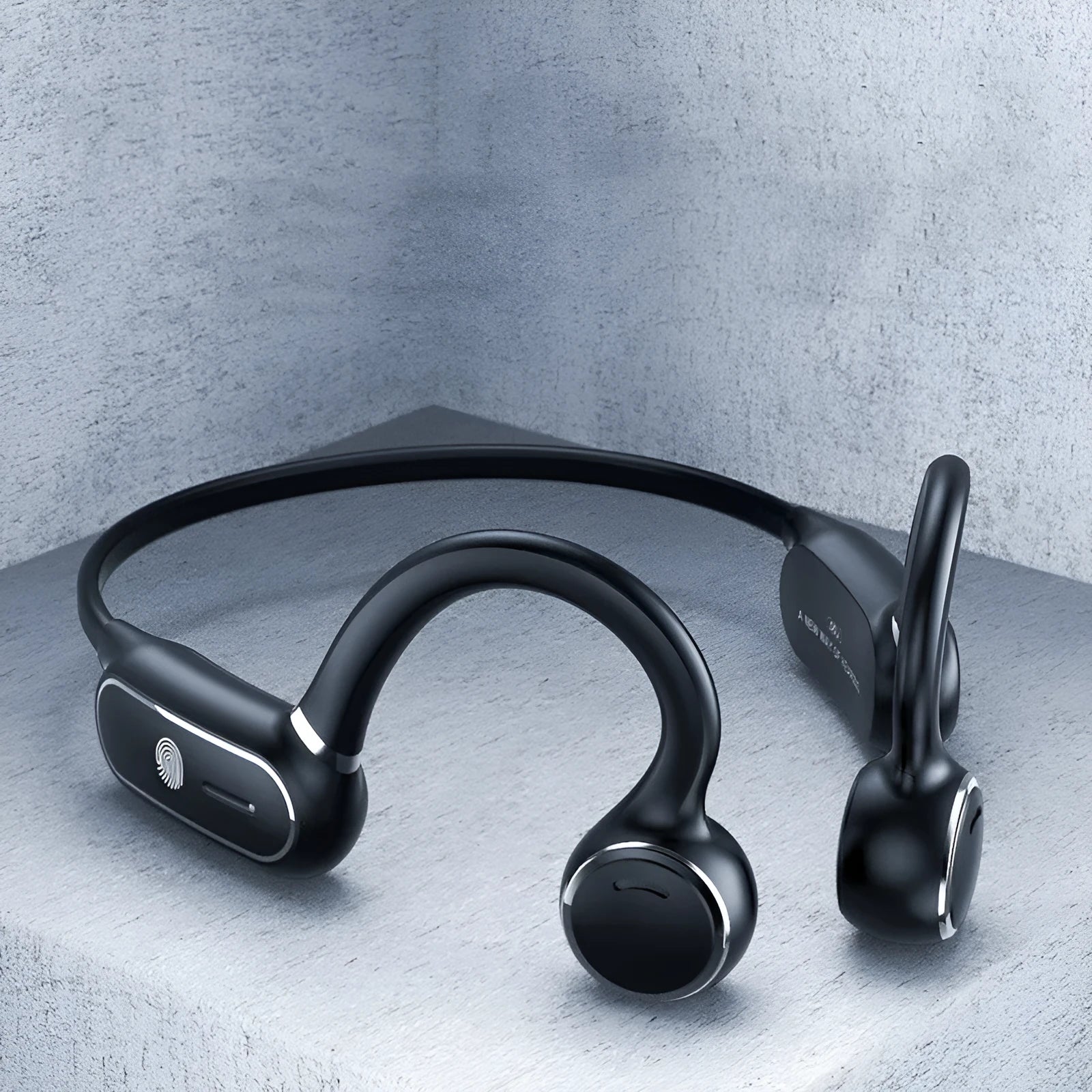 Black air conduction wireless Bluetooth earphones with an ergonomic ear hook and flexible titanium neckband.