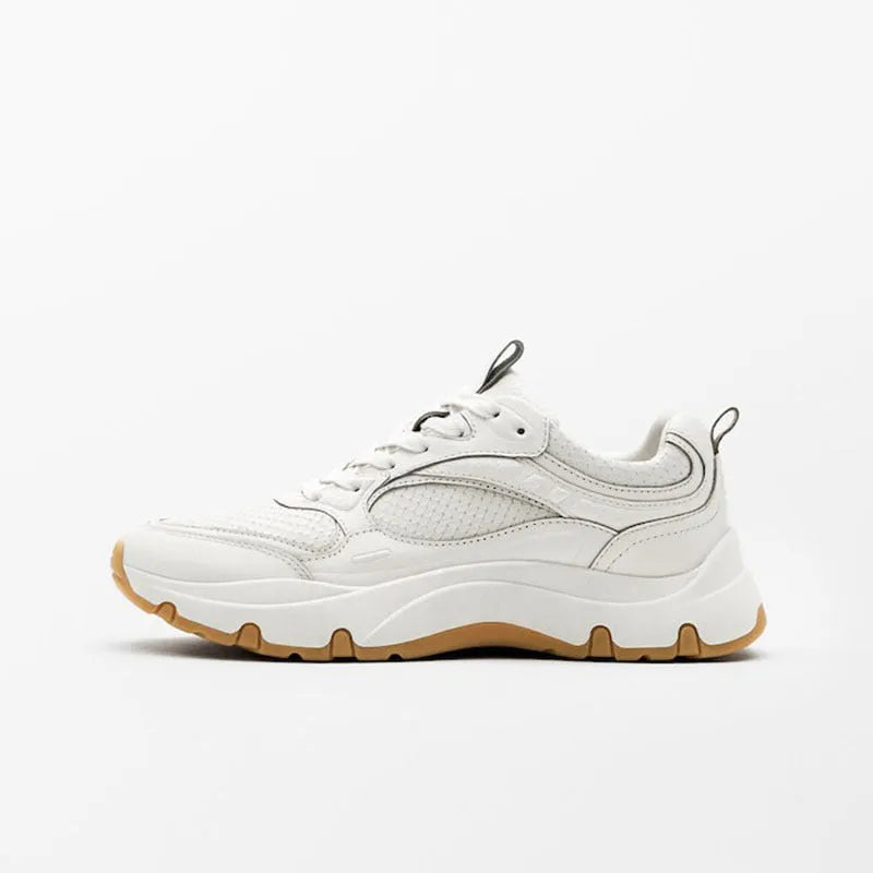 Women's beige off white round toe sneakers with top layer cowhide upper, cross straps, and thick sole