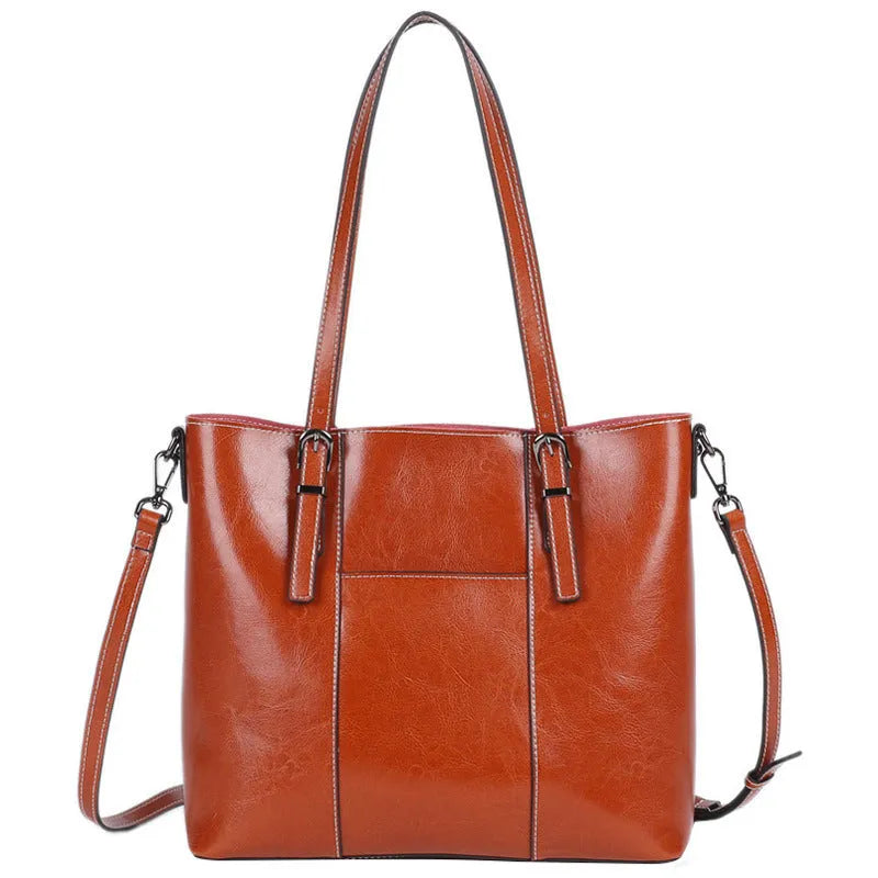 Genuine leather women's retro shoulder bag in brown with multiple compartments and straps