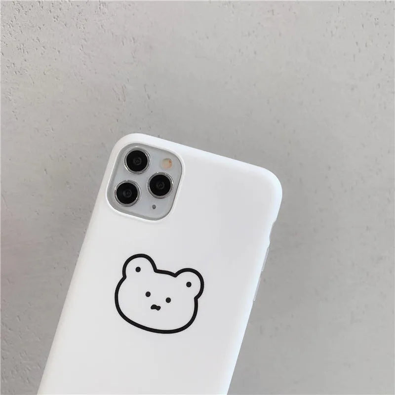 Silicone mobile phone case with a cartoon bear design for Apple iPhone models.