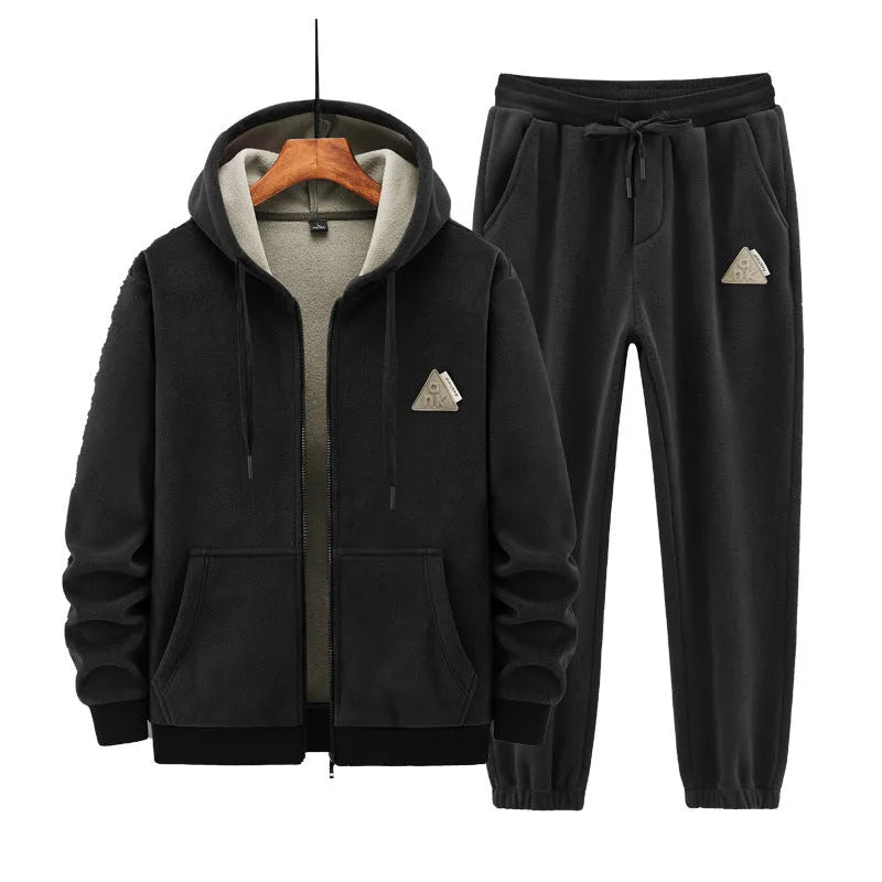 Grey cashmere hooded sweater and cotton pants two-piece sports suit laid flat.