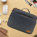 Grey three-layer travel storage bag with waterproof polyester construction and sewing line detailing