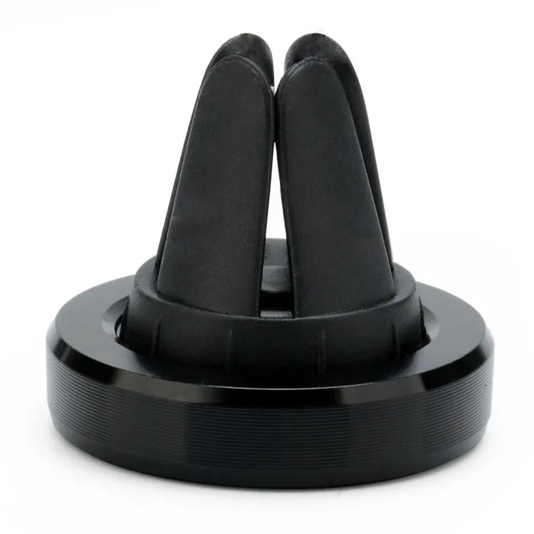 Magnetic car phone holder mounted in vehicle air vent in rose gold colour