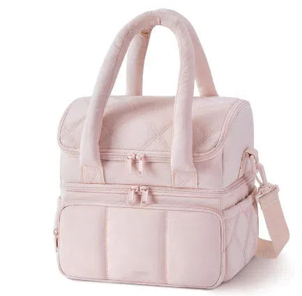 Double-layer insulated quilted pufferfish lunch bag in pink with curved shoulder straps and patchwork details
