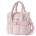 Double-layer insulated quilted pufferfish lunch bag in pink with curved shoulder straps and patchwork details