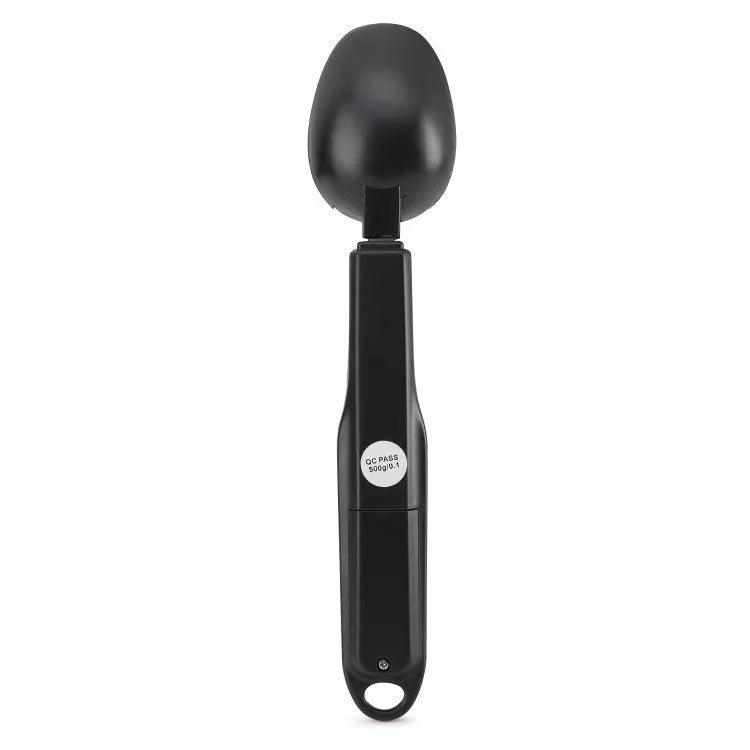 Smart digital measuring spoon with LCD display showing weight, used as a kitchen scale for food ingredients.