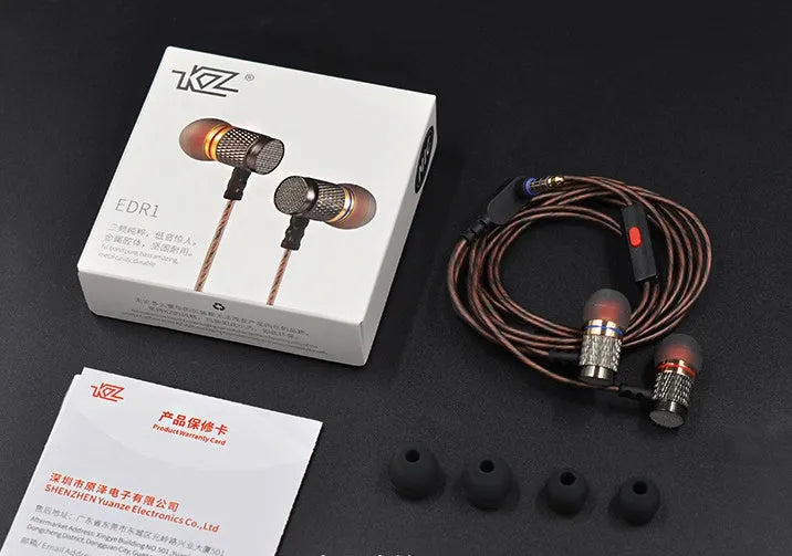 Black wired in-ear headphones with 3.5mm L-bend plug, silicone cable, and TPE earplugs.