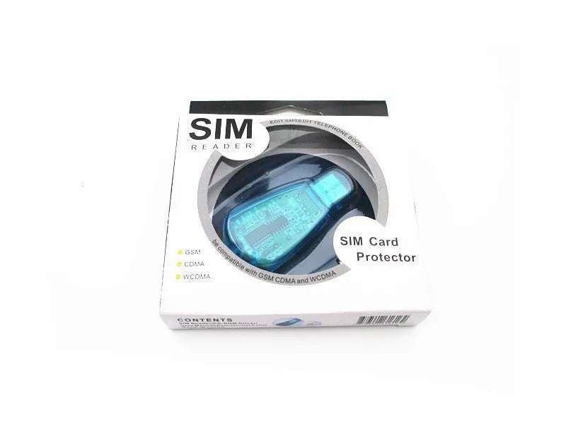 A blue external USB SIM card reader for mobile phones on a flat surface.
