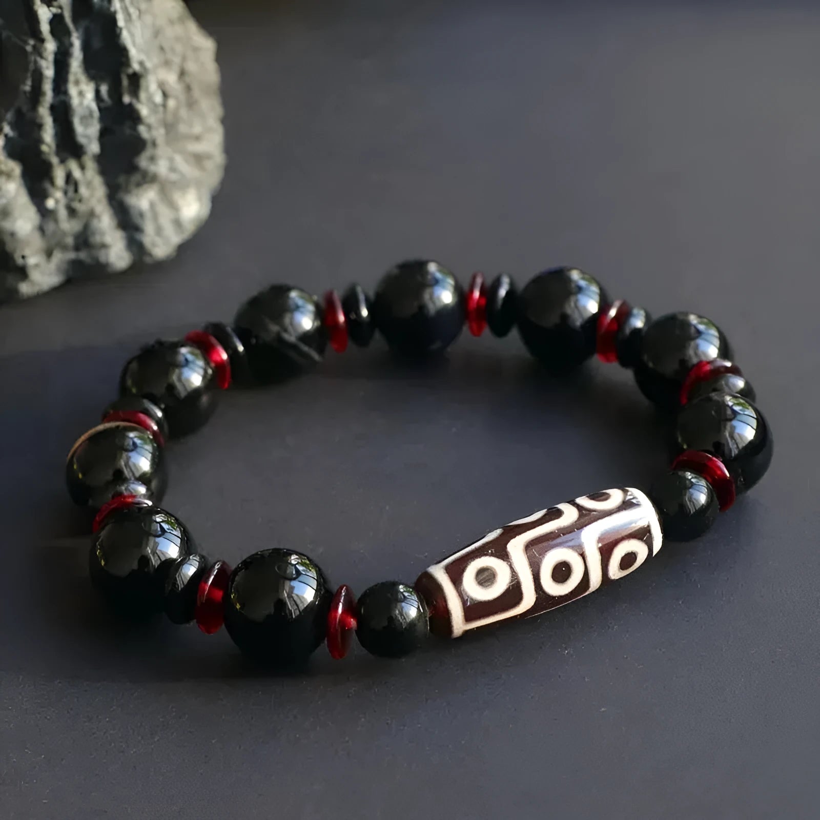 Hand-woven black agate dzi bead bracelet with 11mm geometric beads