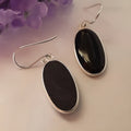 Women's fusion style earrings with oval black agate pendant in electroplated 925 silver geometric setting