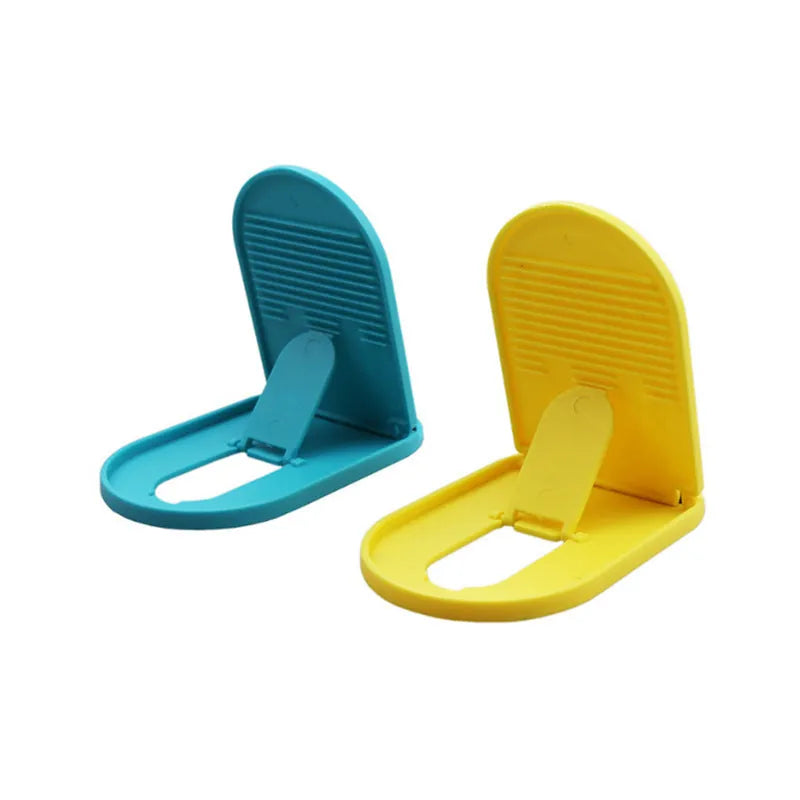 Plastic mobile phone stand in six colours showing 360-degree rotation feature