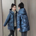 Women's loose thick winter hooded jacket in down cotton with regular long sleeves