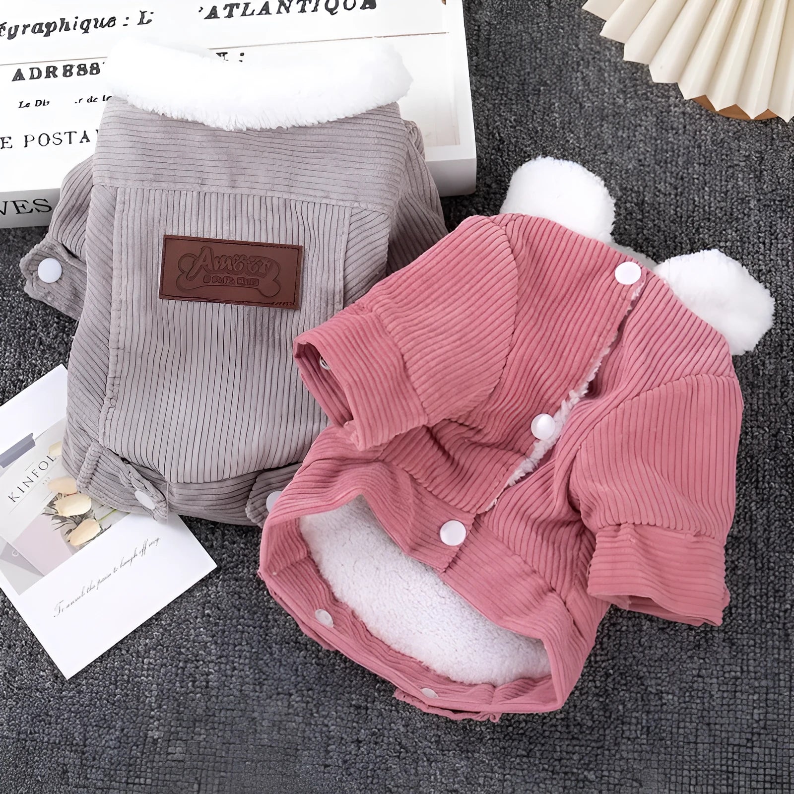 Lambswool fleece-lined pet vest for dogs and cats in grey or pink, available in six sizes