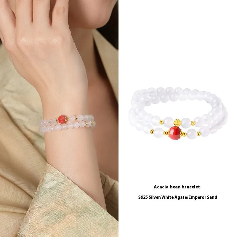 White agate double layer bracelet with jequirity bean cinnabar charm in geometric design