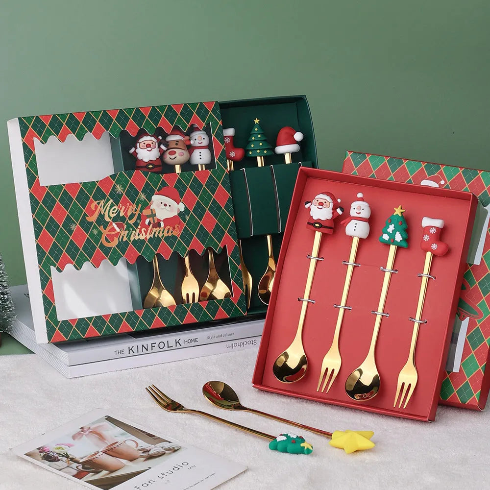 Red stainless steel Christmas spoon and fork set with snowman and Christmas tree designs