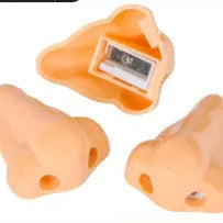 Flesh colour plastic pencil sharpener with large nostril design measuring 58x45x30mm