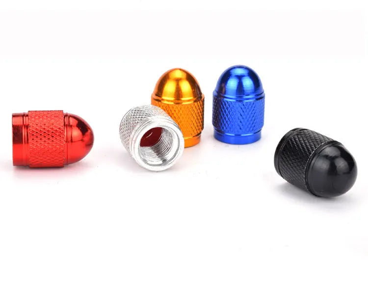Aluminium mountain bike tyre valve cap in choice of five colours: black, blue, gold, red, silver.
