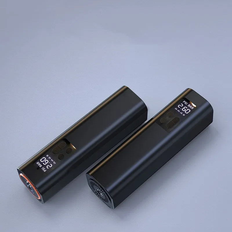 Black digital car tyre inflator with LCD display showing pressure readings