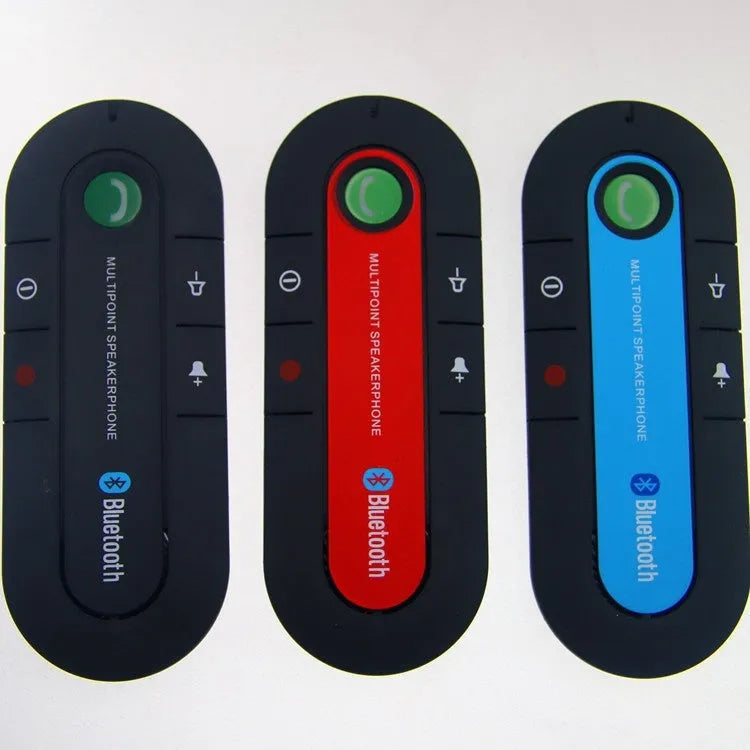 Black vehicle-mounted Bluetooth handsfree device clipped to car sun visor with car charger cable