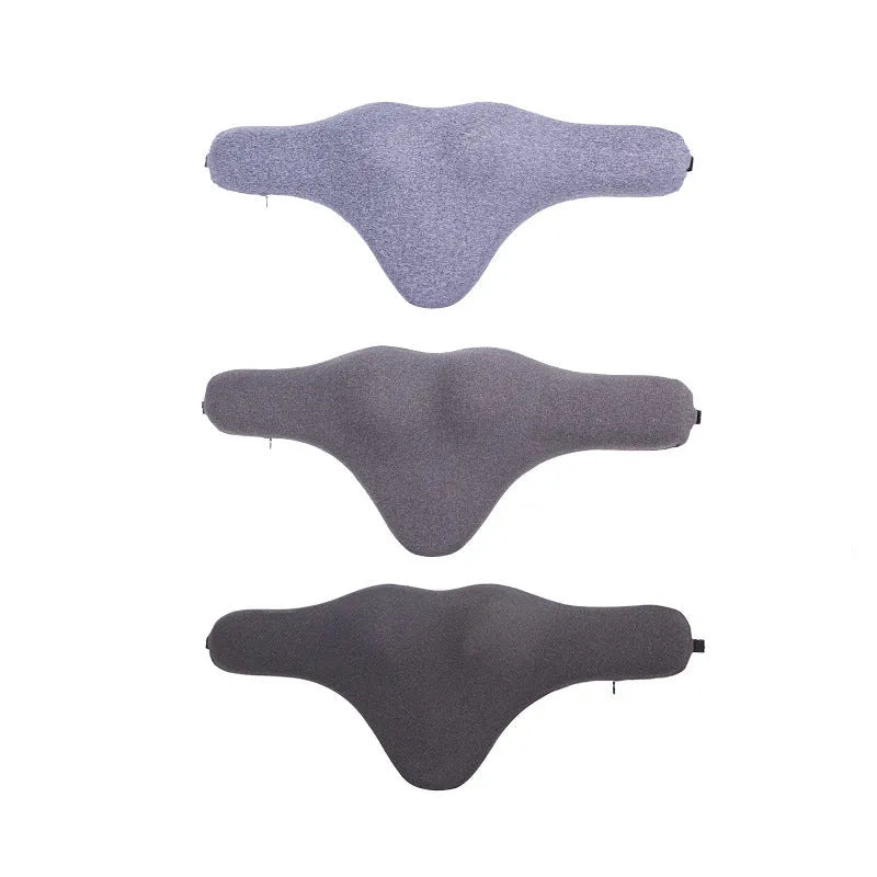 Dark gray universal car neck memory foam pillow on a car seat headrest.