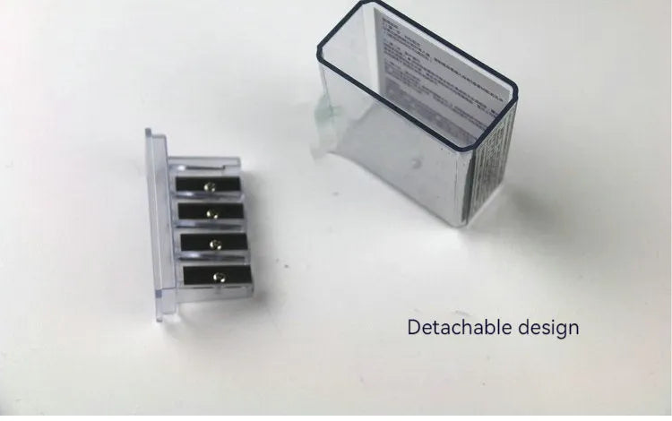 Geometric shaped plastic pencil sharpener with four distinct sharpening holes.