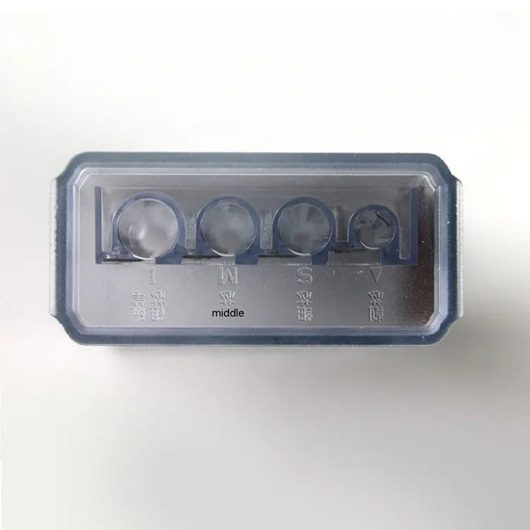 Geometric shaped plastic pencil sharpener with four distinct sharpening holes.