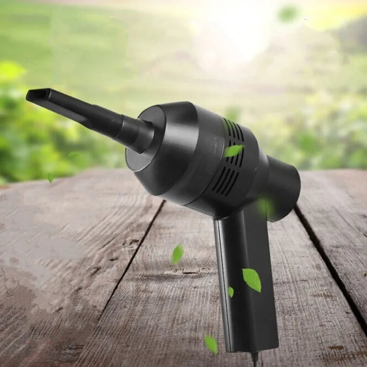 Black desktop mini vacuum cleaner with USB cable and dust collection chamber for keyboard and small space cleaning