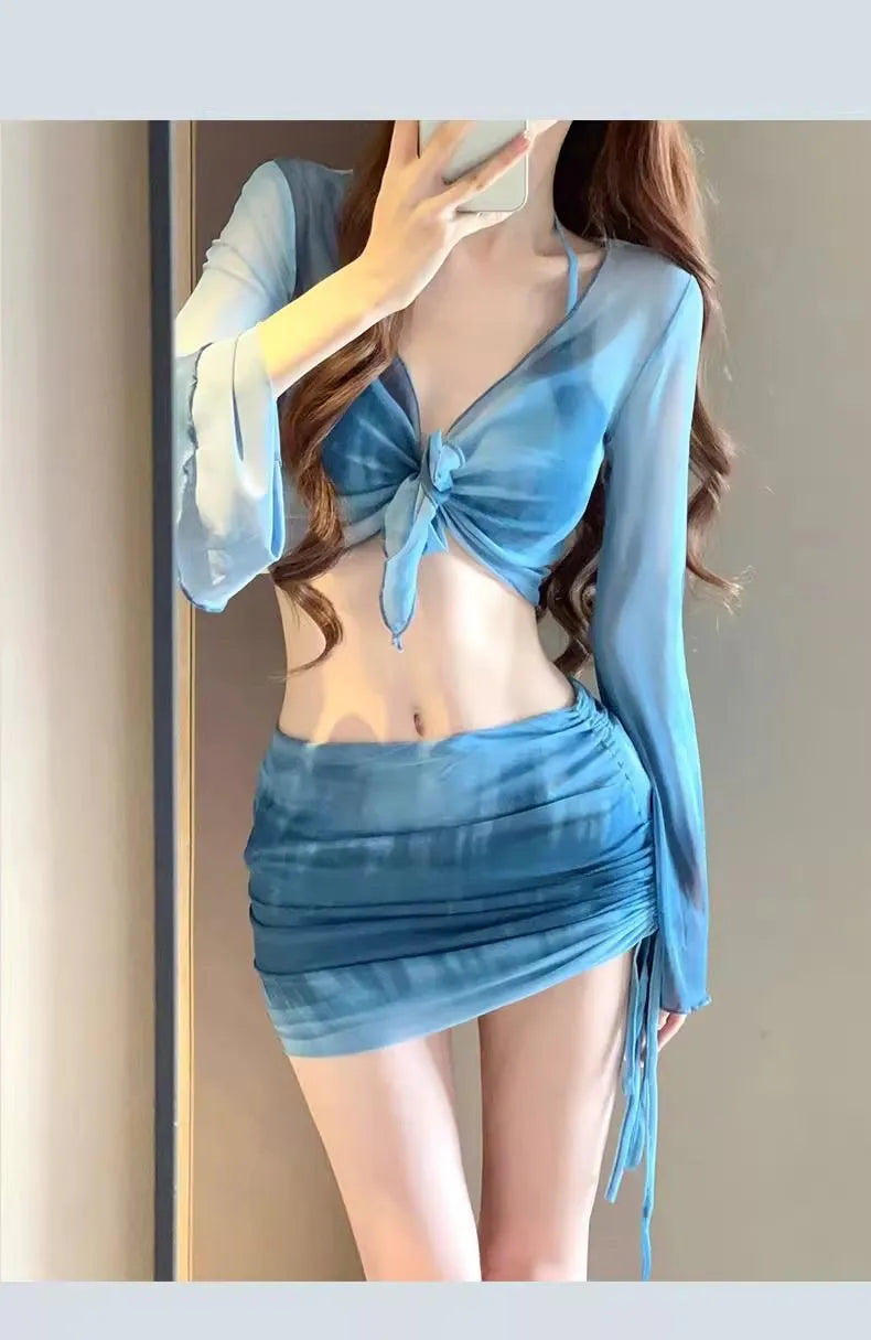 Women's blue high waist bikini four-piece swimsuit set with ruffle skirt