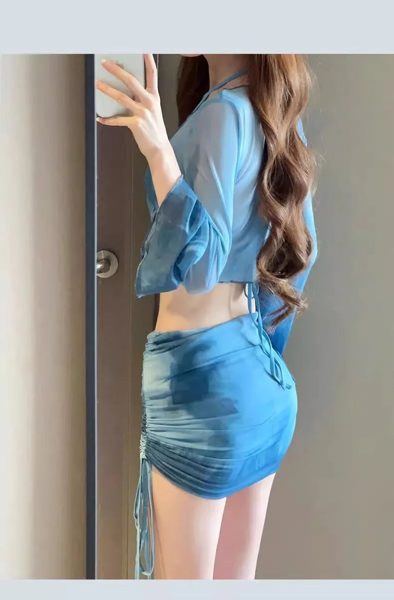 Women's blue high waist bikini four-piece swimsuit set with ruffle skirt
