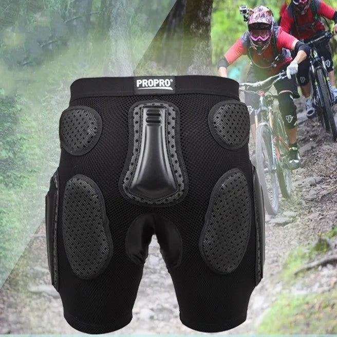 Black cycling hip protection pants shown flat, highlighting the hip pad area and available in sizes S, M, L, XL.