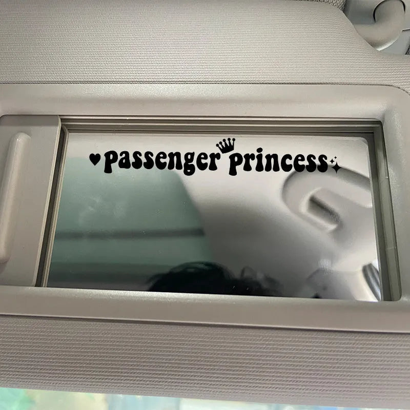 Passenger Princess humorous car sticker shown in multiple colour options on car rearview mirror