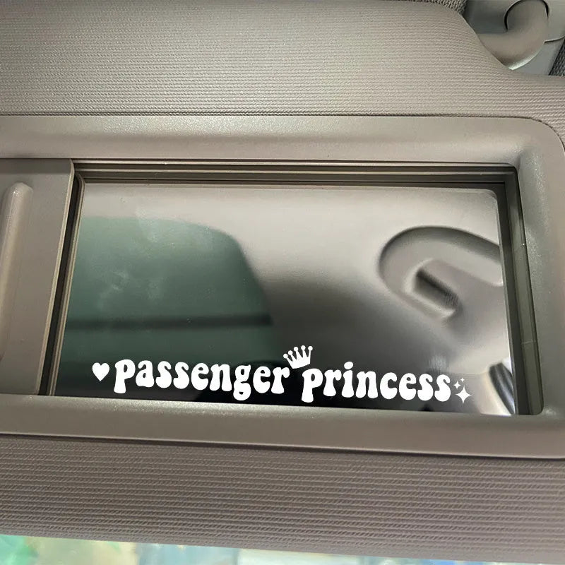 Passenger Princess humorous car sticker shown in multiple colour options on car rearview mirror