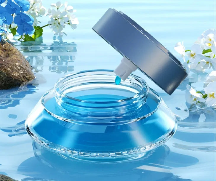 Smart spray car air freshener unit with refillable design, shown with fragrance refill bottle.
