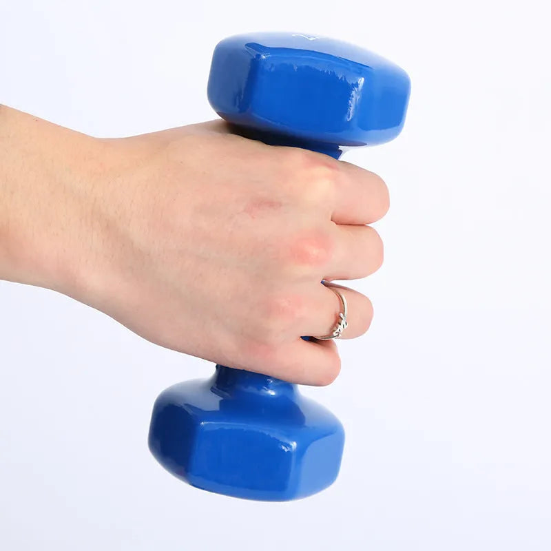 Bright coloured plastic fitness dumbbells with glossy surface in various weights for home workouts