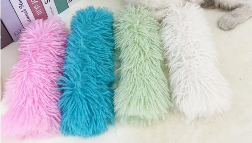 Cat plush toy pillow in four colours measuring 27 by 10 centimetres