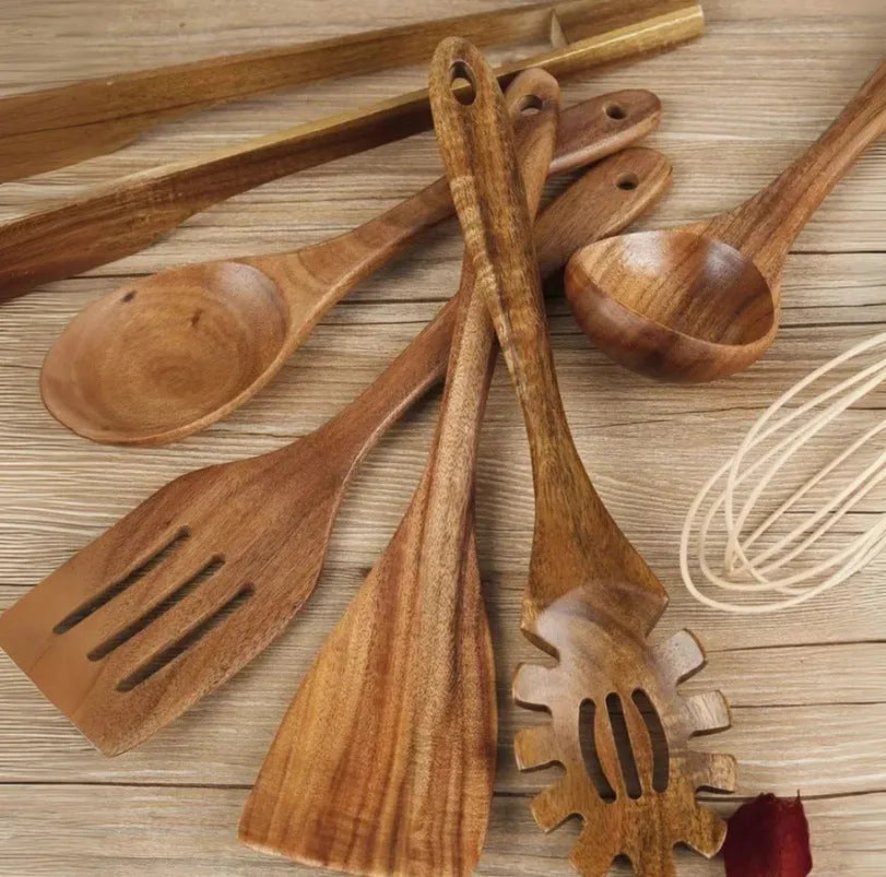 Seven-piece wooden cooking utensil set including spoons and spatulas for non-stick pans