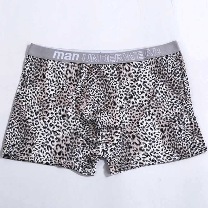 Men's leopard print loose underwear in polyester milk silk fabric showing mid-waist cut