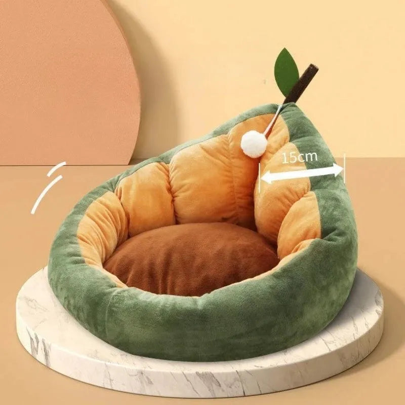 Oval pet bed with cotton cover and raised sides in coffee colour, shown with small cat