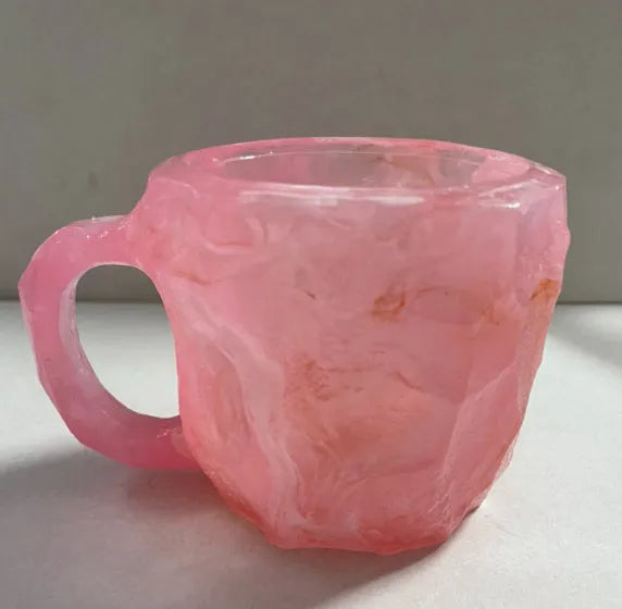 Purple resin mineral crystal coffee mug with handle showing 3D texture and 10cm height