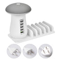 White mushroom-shaped USB charging dock station with five ports and integrated LED night light on a desk.