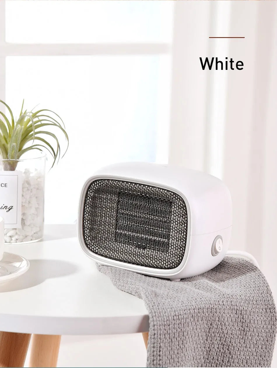 Compact green mini heater with PTC ceramic heating, 500W power, and flame-retardant ABS construction