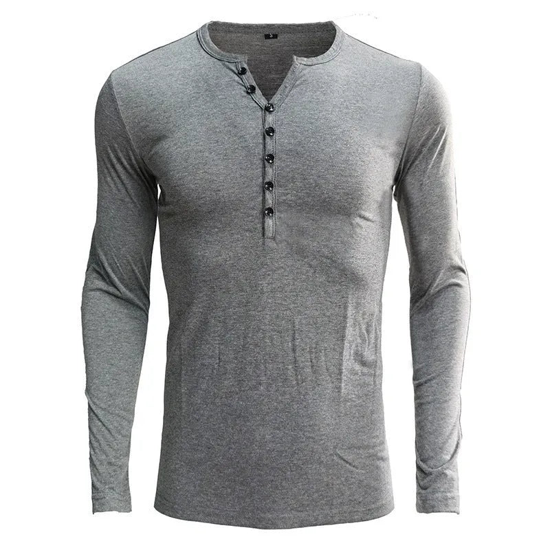 A solid colour long sleeve men's henley shirt in a cotton blend fabric.
