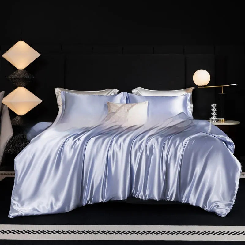 Solid colour silk bed sheet four-piece set in a modern bedroom setting, showing one of seven available colour options.