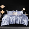 Solid colour silk bed sheet four-piece set in a modern bedroom setting, showing one of seven available colour options.