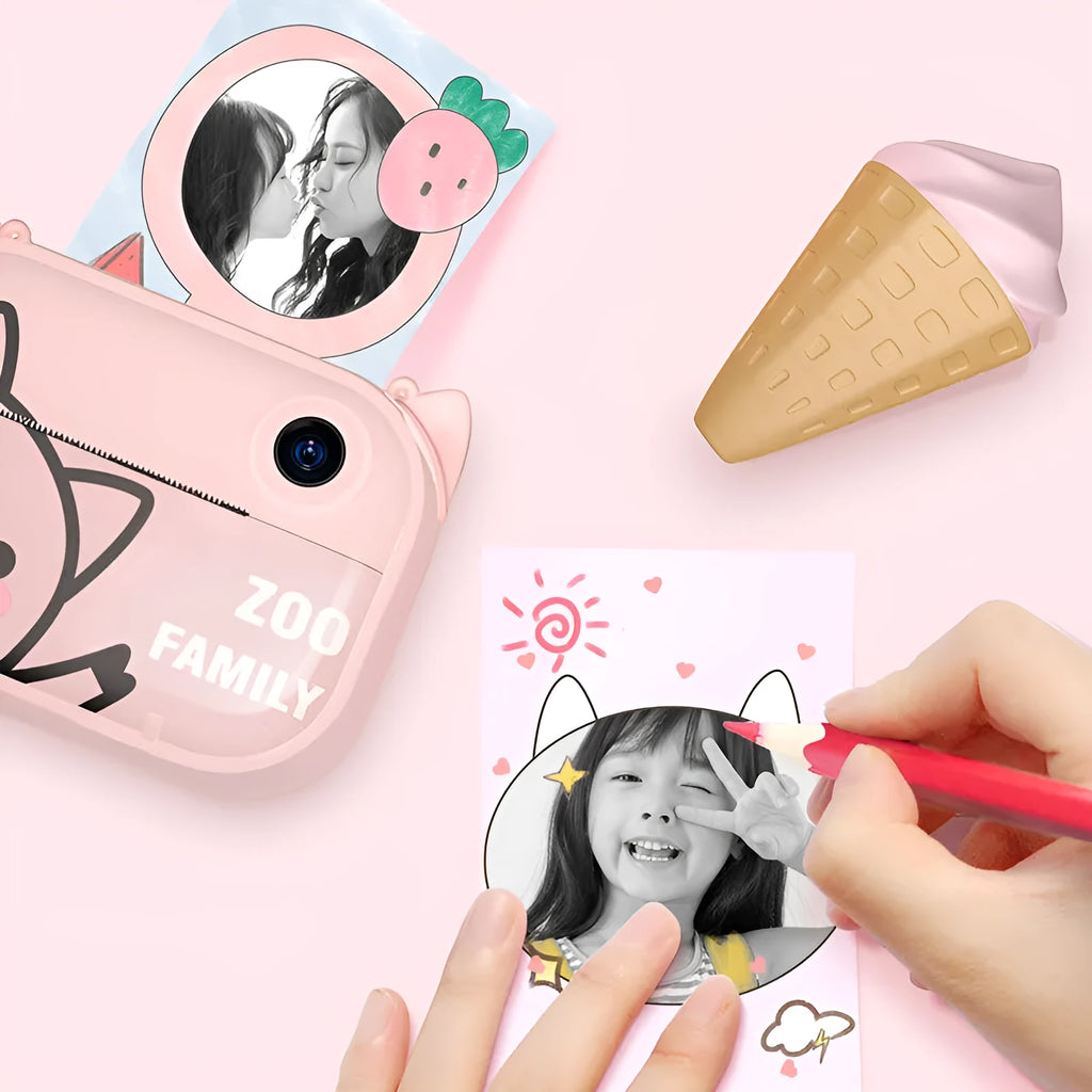 Pink instant print digital camera with 2.4-inch LCD screen showing photo preview