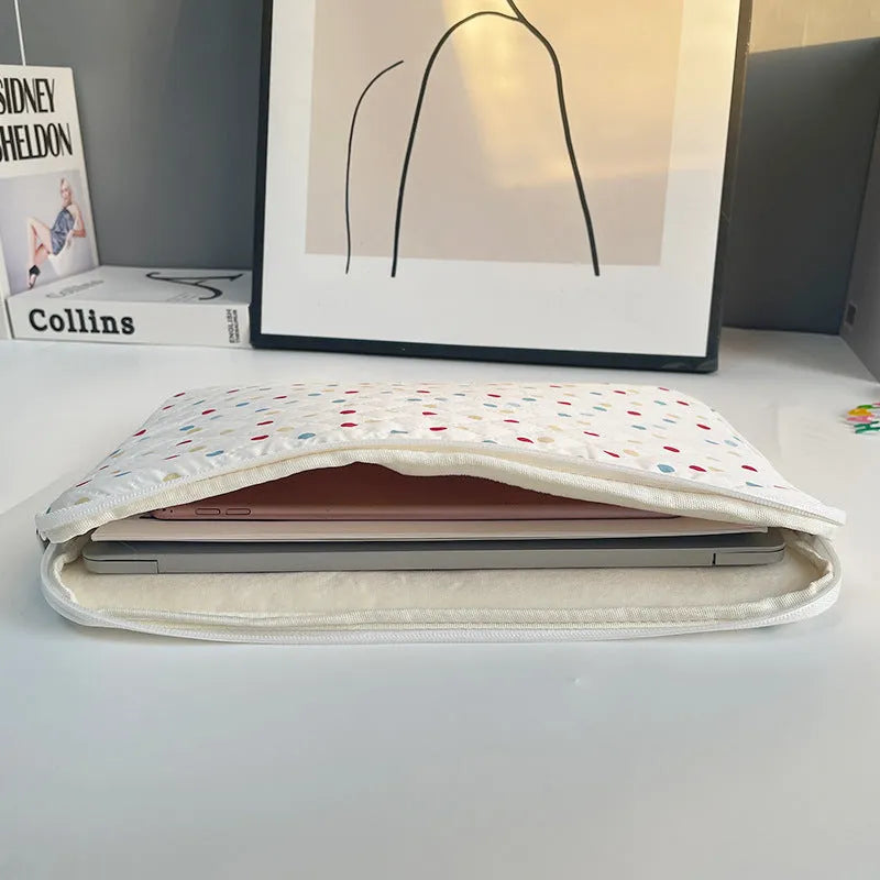 Women's polka dot laptop bag in breathable polyester with size options for computer protection