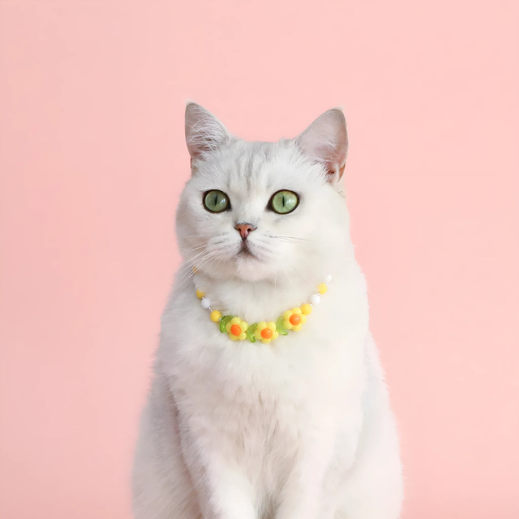 Colourful plastic cat necklace with bead patterns in rainbow, peach or small flower designs on adjustable 15-35cm collar