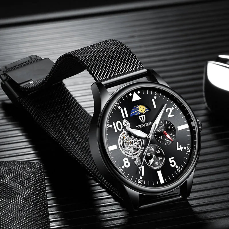 Black men's mechanical watch with luminous hands, moon phase display on a 41mm alloy case.